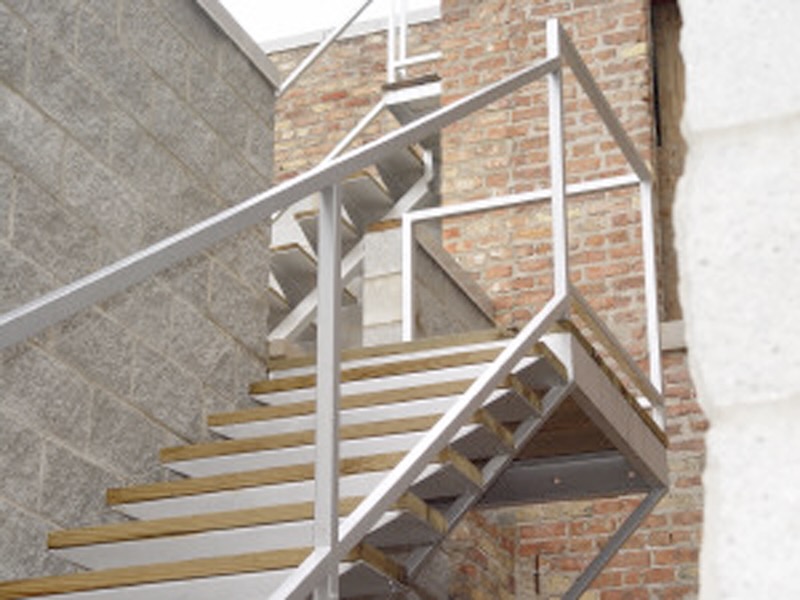 A straightforward steel stair railing with standard geometry