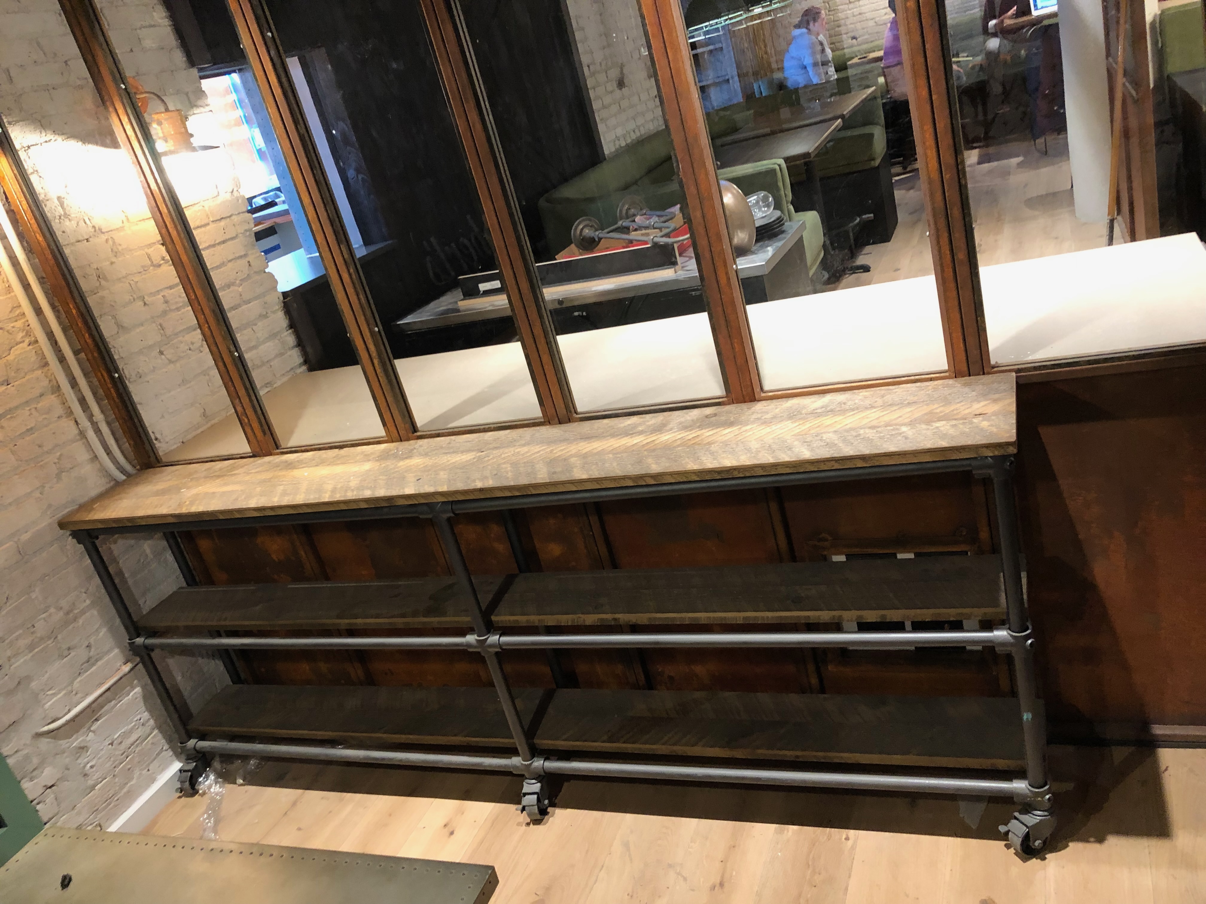 Custom steel-and-wood window detail at Roberts Pizza